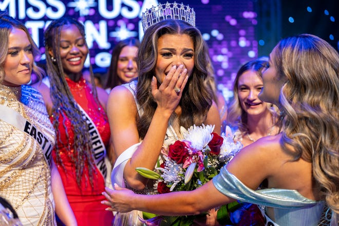 Alma Cooper, an Army officer, is crowned Miss Michigan USA 2024 on Sunday at the McMorran Place & Entertainment Center in Port Huron.