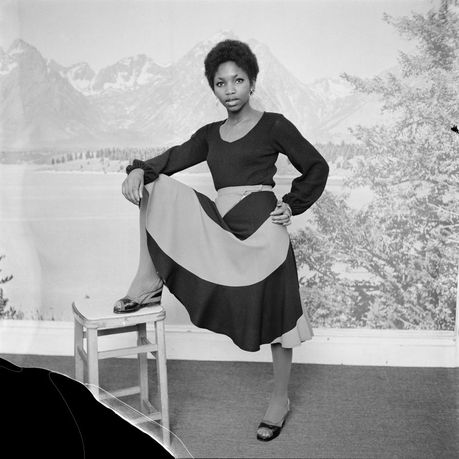 (unidentified) Beauty queen posing in front of alpine backdrop, London, 1970s. From the portfolio 'Black Beauty Pageants'. © Raphael Albert, courtesy Autograph ABP